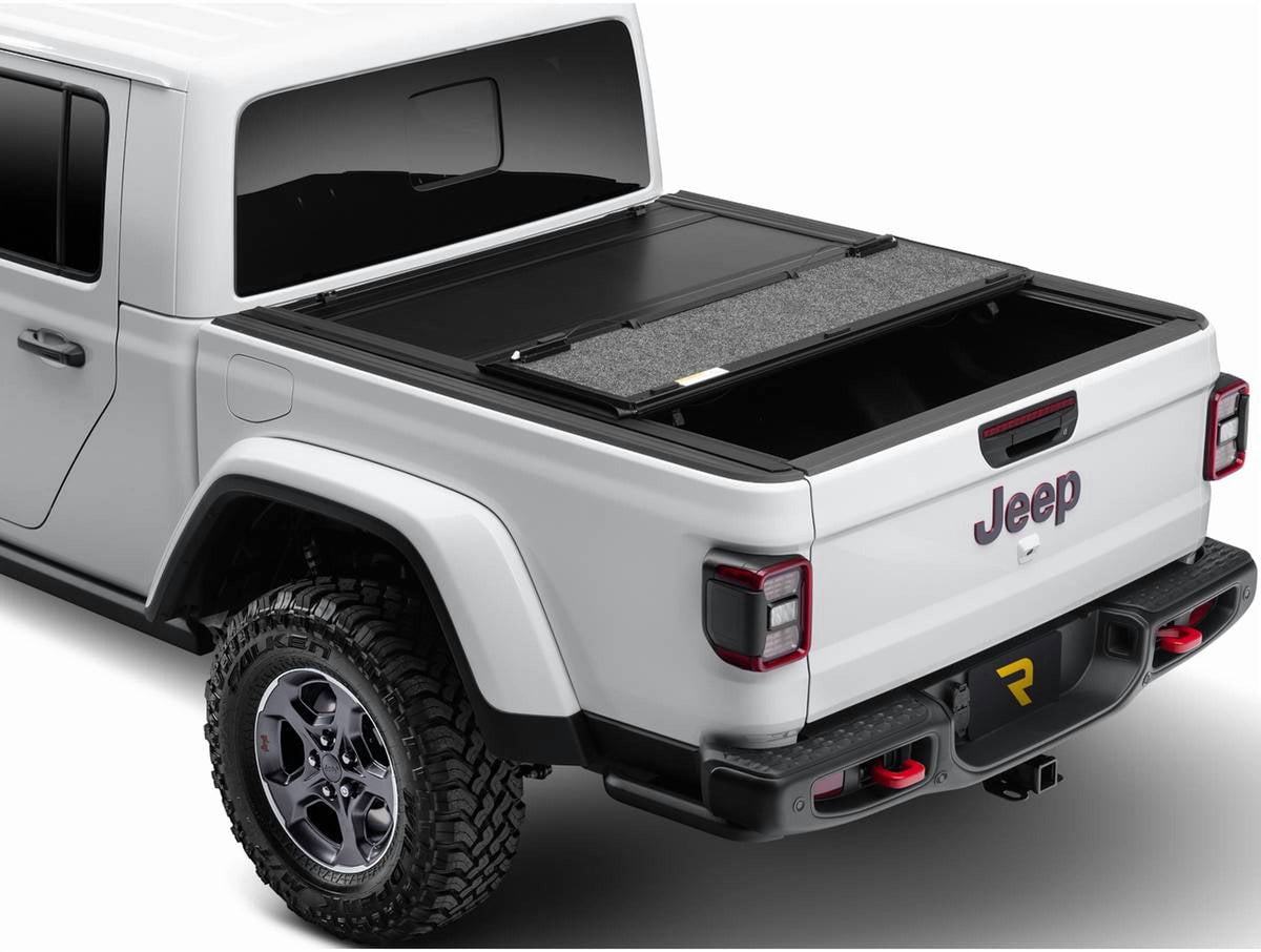 Undercover UX52013 RealTruck UnderCover Ultra Flex Hard Folding Tonneau Cover Fits 2016-2025 Nissan Titan w/ track system 5'7" Bed (67")