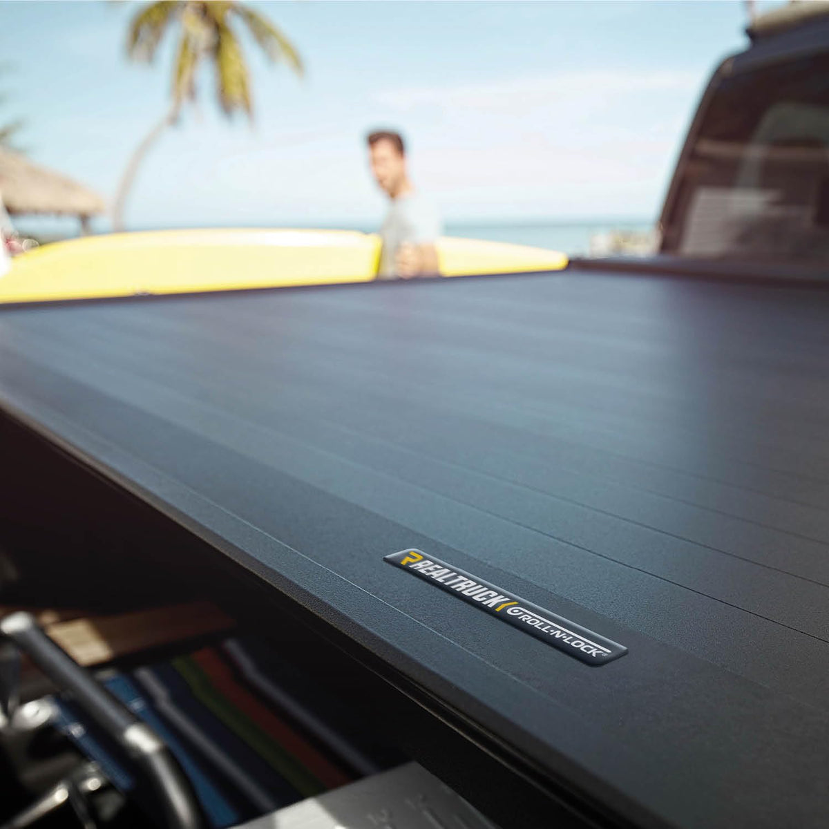 ROLL N LOCK RC132E RealTruck Roll-N-Lock E-Series Retractable Truck Bed Tonneau Cover | RC132E | Fits 2021 - 2025 Ford F-150 5' 7" Bed (67.1")