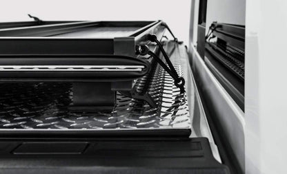 ACI B3010019 ACI Lomax Folding 15-20 Ford F-150 5.6' Box Hard Tonneau Cover Black Urethane