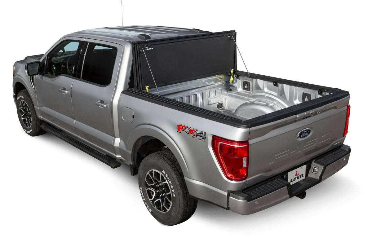 LEER 631286 LEER HF350M Tri-Folding Truck Bed Tonneau Cover, Fits Toyota Tacoma Double Cab with Deck Rail System, Years 2016-2023, 5'2" Truck Bed, Black