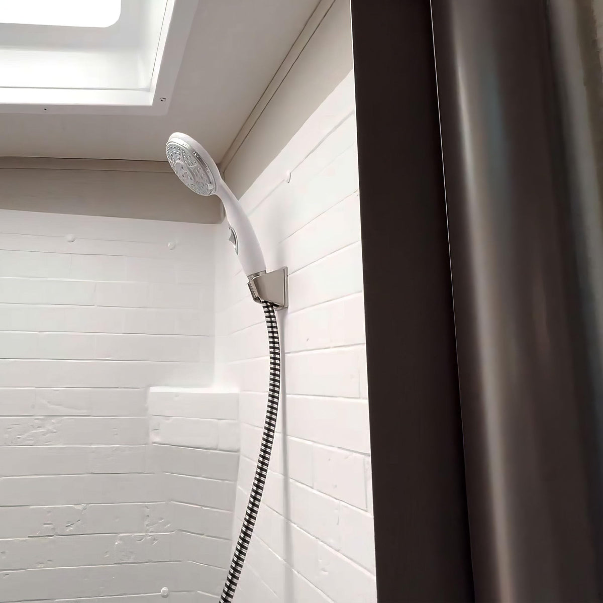 CAMCO 43711 Camco RV Shower Head - Features Convenient On/Off Switch & 5 Different Spray Patterns - Designed to Conserve Potable Water - Simple to Clean w/Rubber Spray Tips - White (43711)