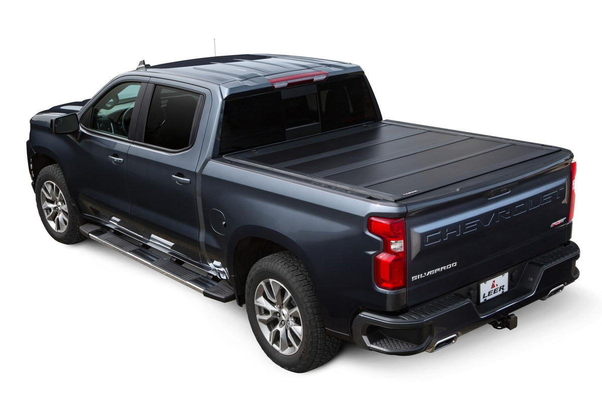 LEER 650320 LEER HF650M Quad-Folding Truck Bed Tonneau Cover, Fits Chevy Silverado and GMC Sierra HD, Years 2020-2024, 6'9" Truck Bed, Black