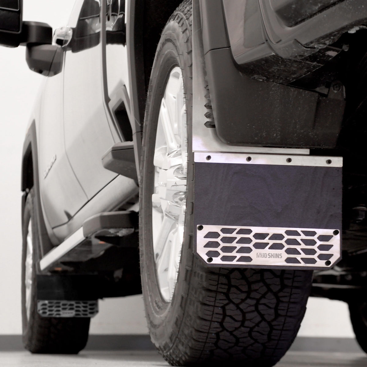 PUTCO 78100 Putco Brushed Stainless Steel HEX Steel Mud Skins - Front Pair - Fits Chevy Silverado 1500 / GMC Sierra 1500 / Dodge Ram Truck 1500 2014-2025