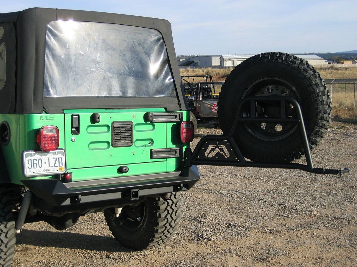 FAB FOURS JP-Y1251T-1 Fab Fours JP-Y1251T-1 Tire Carrier for Jeep TJ/LJ '97-'10