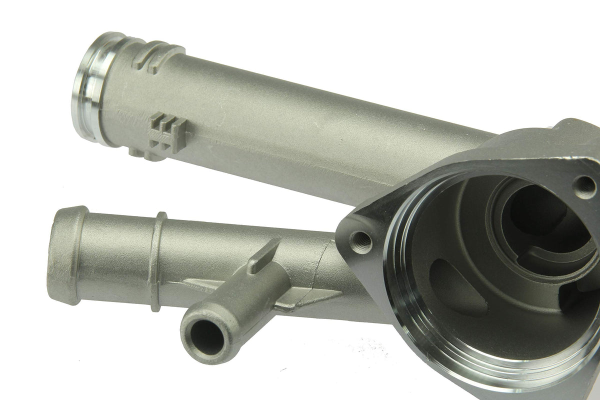 URO Parts 03H121117A-PRM Thermostat Housing, HD aluminum vs OE plastic