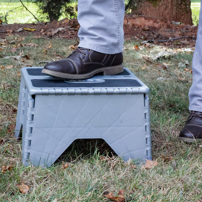 CAMCO 43635 Camco 9" Folding Step Stool with Non-Skid Feet, Folds Flat for Storage, Durable Resistant to Impact Plastic and Resistant to Slip Top Surface, Silver