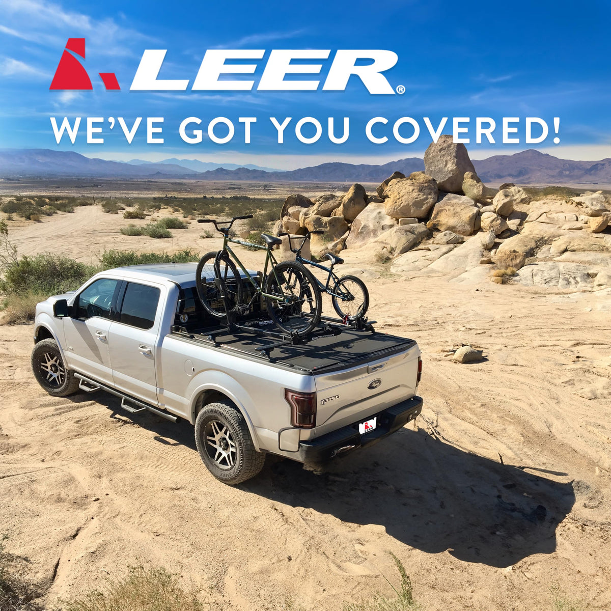 LEER 650284 LEER HF650M Quad-Folding Truck Bed Tonneau Cover, Fits Ford F-150 Light Duty, Years 2004-2014, 5'6" Truck Bed, Black