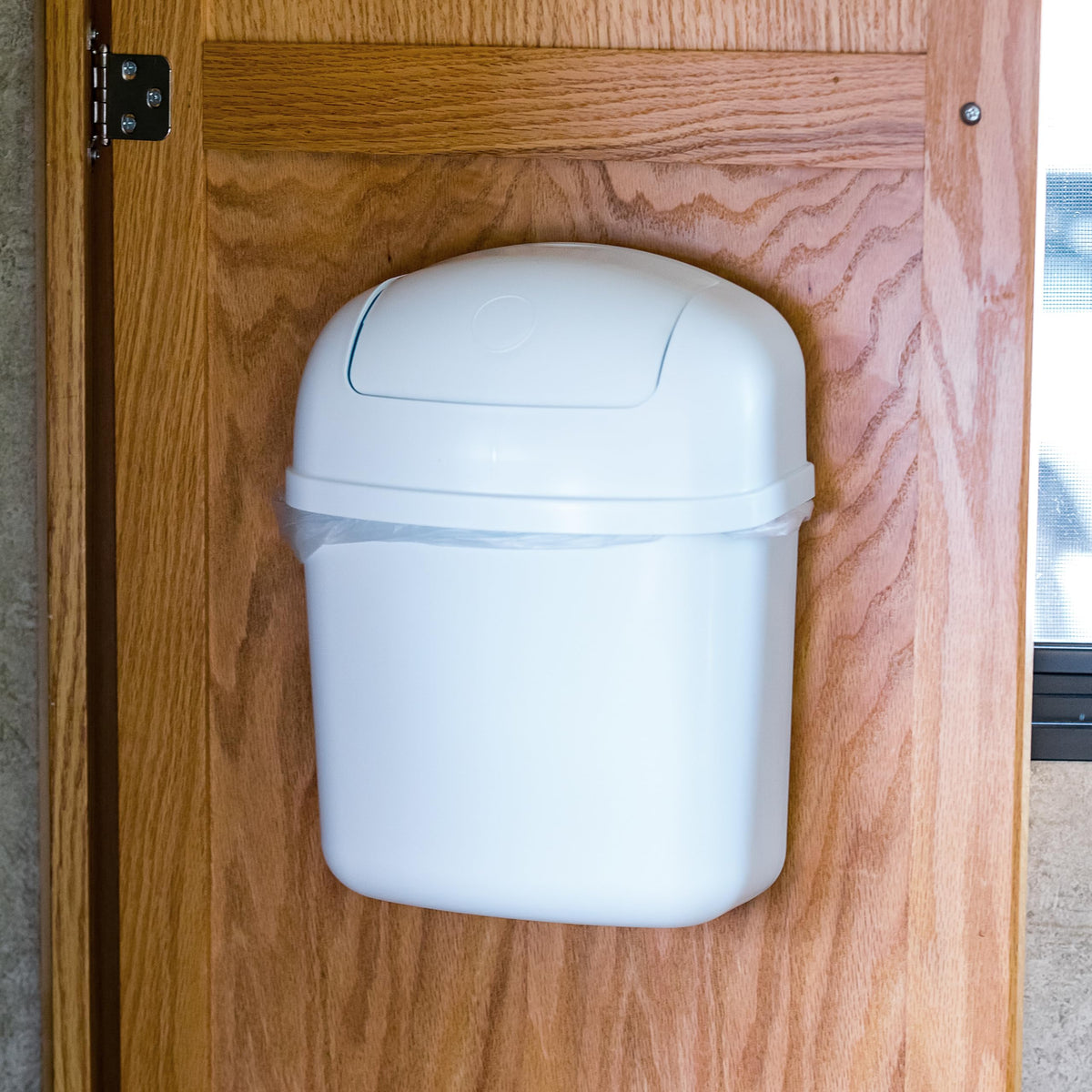 CAMCO 43961 Camco Cabinet Mount Trash Can - Small Design Perfect for Compact Locations - Measures 8.5 x 5 inches - Features Spring-Top Lid, 3 Quart Capacity, & Screw-in Mount Design - Hardware Incl. (43961)